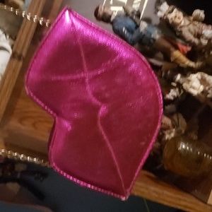 Lip shaped hand bag.